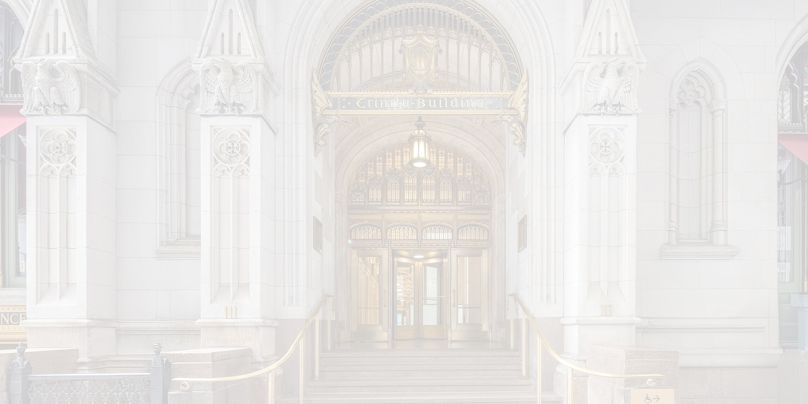 Entrance of the Trinity Building, ornate architecture.