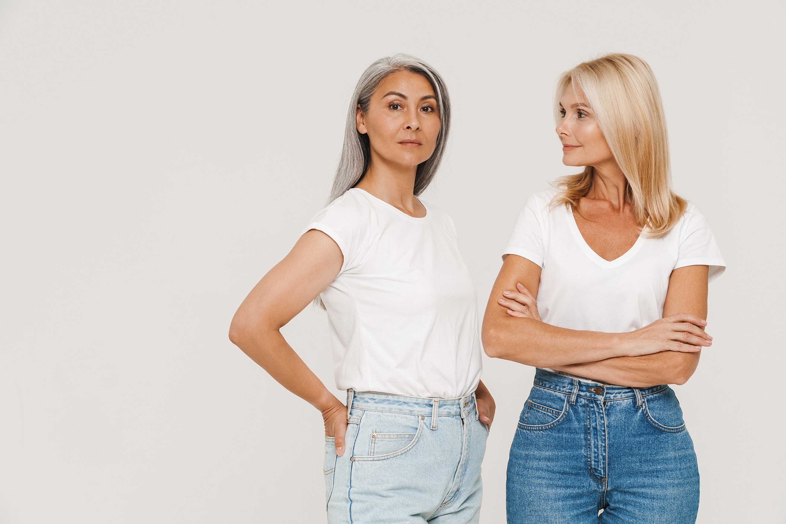 Two women in stylish casual attire.